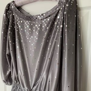 Glam is up with this gray and silver ombré top